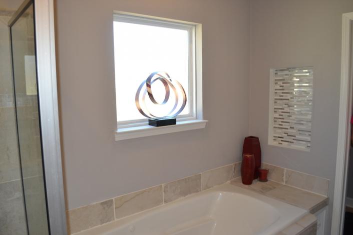 Relax in your dream bathroom with a gorgeous, spacious bath tub. 